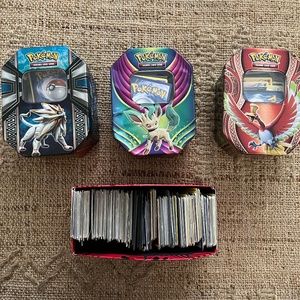 Pokémon cards and metal boxes